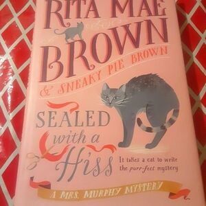 Sealed With a Hiss 2025 Rita Mae Brown hardcover book.  Some reading wear from o